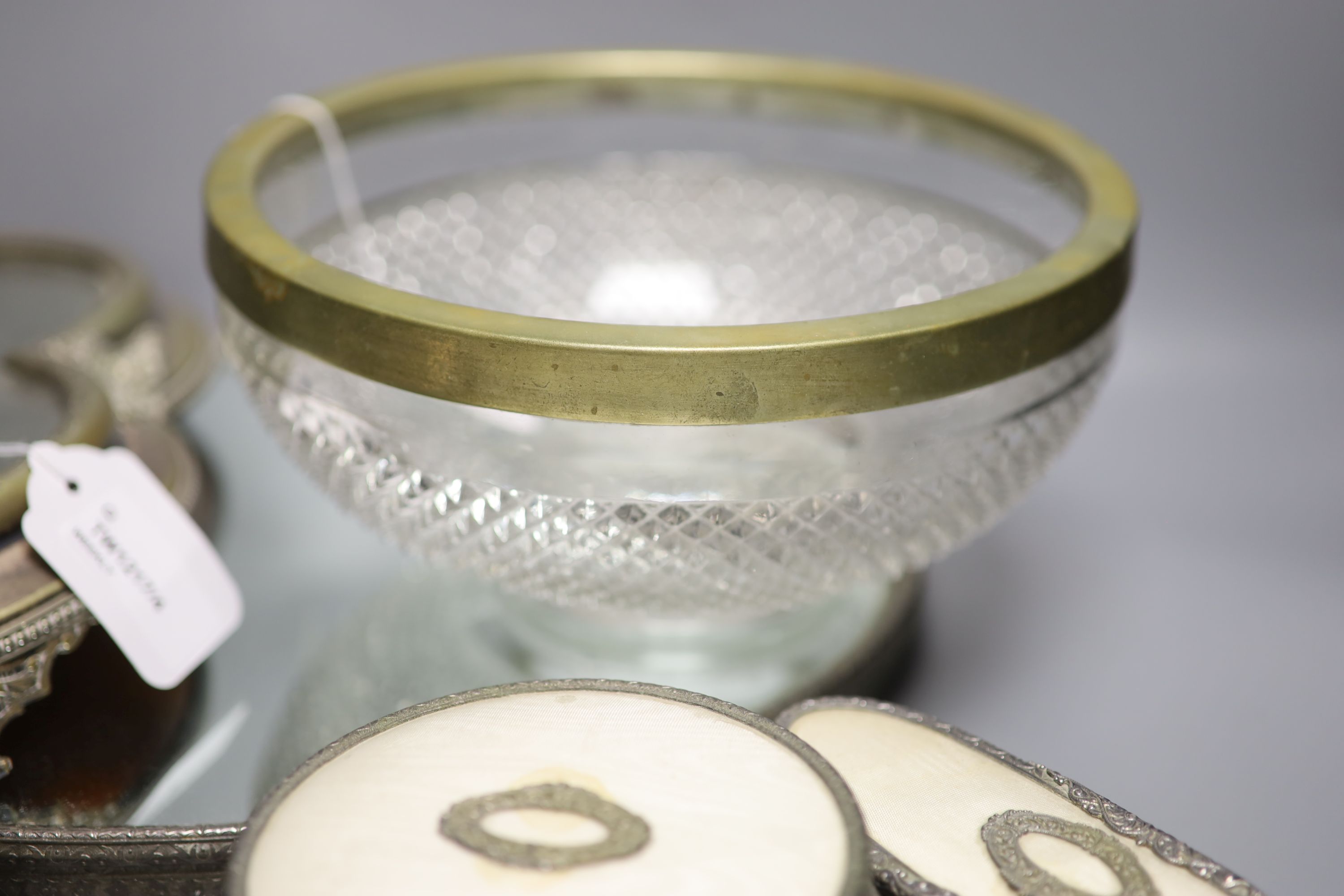 A silver-mounted glass salt and sundry plate, including a five-piece dressing table set, a mirrored decanter stand, a stopwatch, etc.